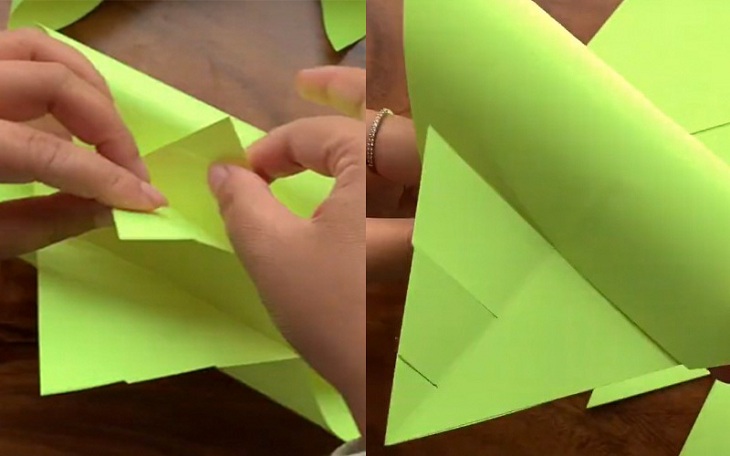 gấp đôi hình lại và nối chúng bằng những đường cắt ở phần đầu mảnh giấy